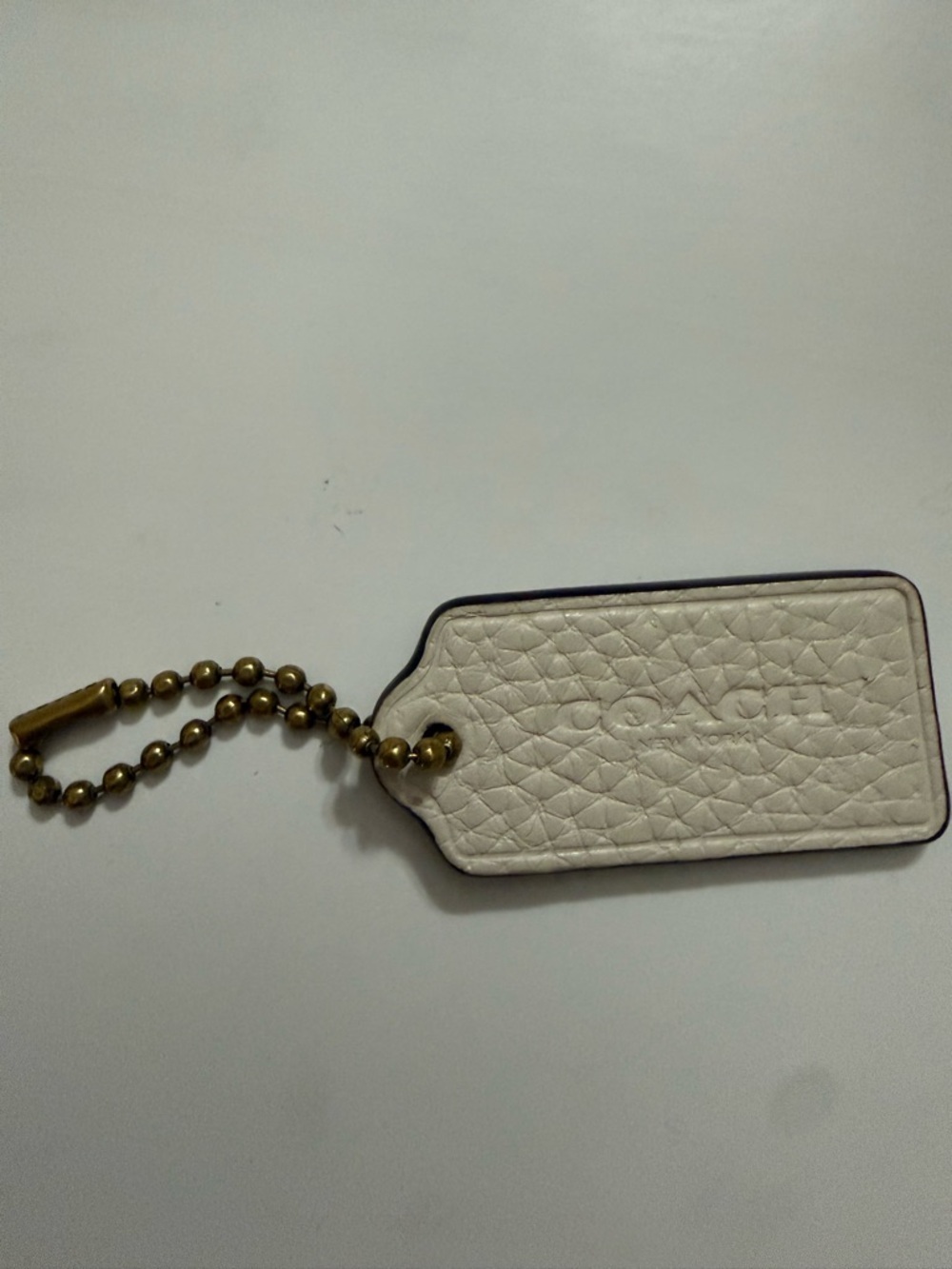 COACH White Leather Bag Tag with Brass Chain